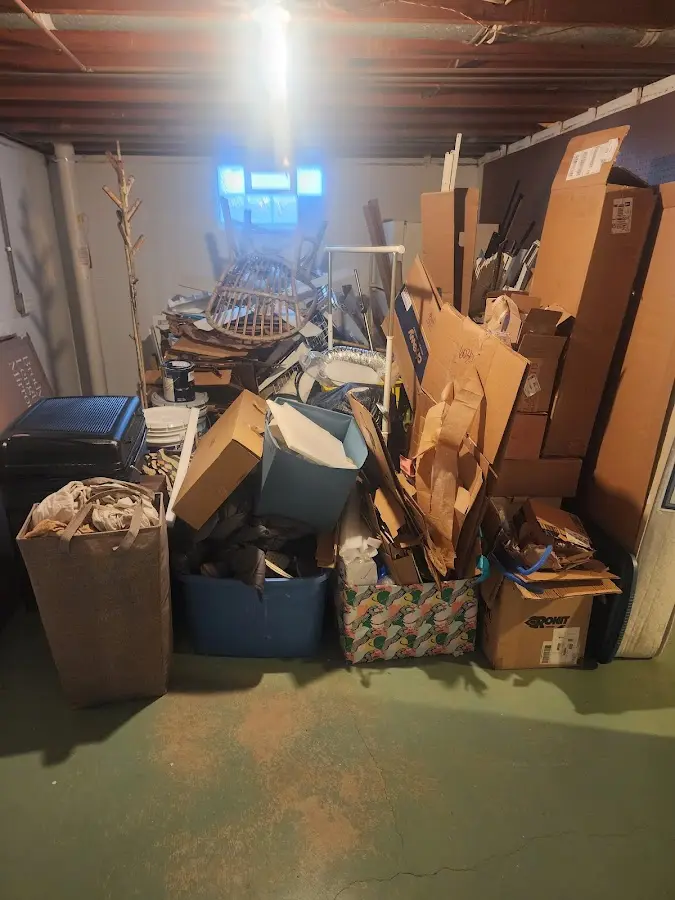 Roll-off dumpster container at job site for 2 Yard Dumpster Rental in Girard